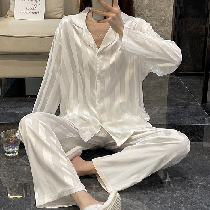 Soft Life Silk Pajama Set flat lay – striped satin sleepwear set top and pants – Lumira Beauty Co.
